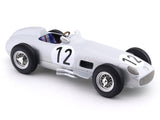 Model of a vintage racing car with the number 12 on a white background