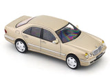 Beige model car on a white background