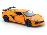 Orange toy car with black wheels on a white background