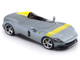 Gray sports car with yellow stripes on a white background