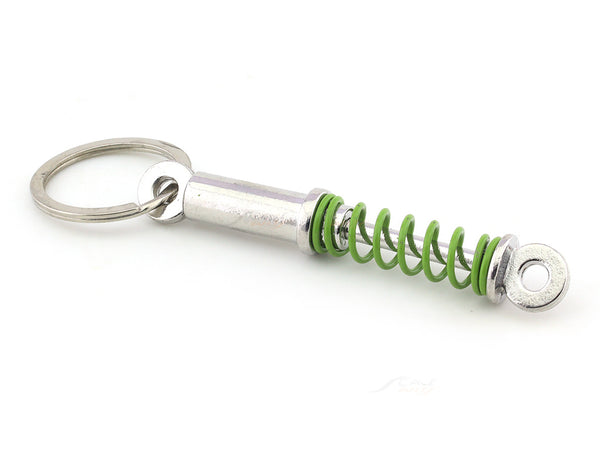 Shock absorber green metal keyring / keychain