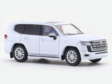 Toyota Land Cruiser LC300 White 1:64 Kyosho Licensed Diecast Scale Model | Mini Car Book Series Collectible with Book