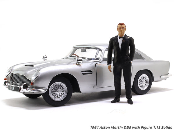 1964 Aston Martin DB5 with Bond style figure 1:18 Solido scale model car collectible.