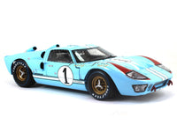 1966 Ford GT40 Mk II #1 Ken Miles Denny Hulme 1:18 Shelby Collectibles diecast scale model car.