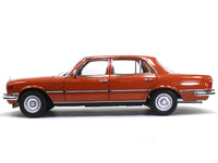 1976 Mercedes-Benz 450 SEL 6.9 W116 orange 1:18 Norev diecast scale model car.