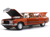 1976 Mercedes-Benz 450 SEL 6.9 W116 orange 1:18 Norev diecast scale model car.