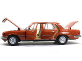 1976 Mercedes-Benz 450 SEL 6.9 W116 orange 1:18 Norev diecast scale model car.