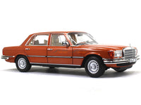 1976 Mercedes-Benz 450 SEL 6.9 W116 orange 1:18 Norev diecast scale model car.