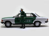 1980 Mercedes Benz 200 Polizei with Figure 1:18 Norev dealer edition scale model.