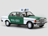 1980 Mercedes Benz 200 Polizei with Figure 1:18 Norev dealer edition scale model.
