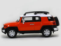 Toyota FJ Cruiser orange 1:64 Stance Hunters diecast scale model car.