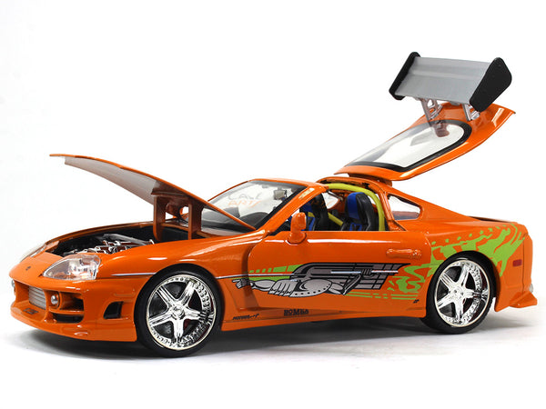 https://scalearts.in/cdn/shop/products/Toyota-Supra-fast-furious-1-24-Jada-diecast-scale-model-collective-7_grande.jpg?v=1616406079